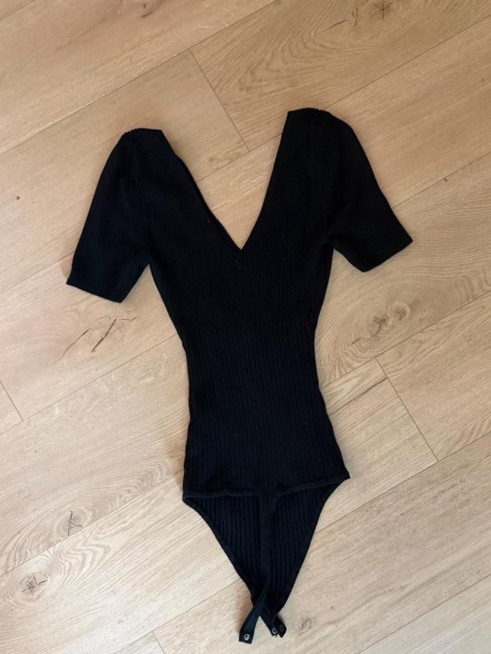 Black Ribbed V-Neck Bodysuit